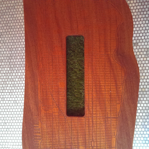 Manhattan in wood, Central Park in moss